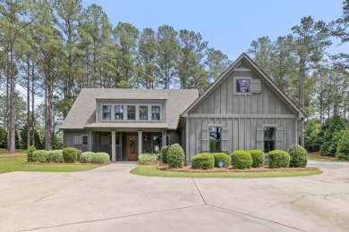 This stunning lake-access home in Cuscowilla offers Lake views on The Golf Club at Cuscowilla in Georgia - for sale on GolfHomes.com, golf home, golf lot