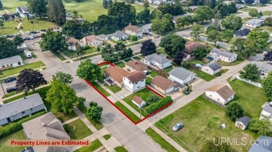 This home has had extreme care and is completely move in ready! on Escanaba Country Club in Michigan - for sale on GolfHomes.com, golf home, golf lot