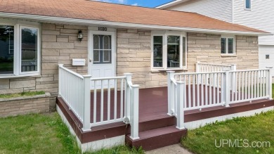 This home has had extreme care and is completely move in ready! on Escanaba Country Club in Michigan - for sale on GolfHomes.com, golf home, golf lot