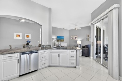 Top-floor 2-bedroom, 2-bath condo located in the heart of the on Pelican Sound Golf and River Club in Florida - for sale on GolfHomes.com, golf home, golf lot