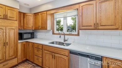 This home has had extreme care and is completely move in ready! on Escanaba Country Club in Michigan - for sale on GolfHomes.com, golf home, golf lot