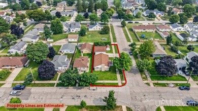 This home has had extreme care and is completely move in ready! on Escanaba Country Club in Michigan - for sale on GolfHomes.com, golf home, golf lot