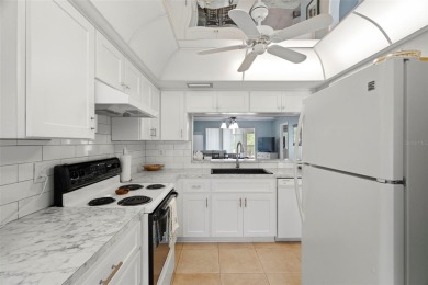 Under contract-accepting backup offers. This beautifully on Seven Springs Golf and Country Club in Florida - for sale on GolfHomes.com, golf home, golf lot