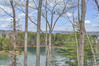 Waterfront living at its finest. Wake each morning to panoramic on The Cliffs At Keowee Falls in South Carolina - for sale on GolfHomes.com, golf home, golf lot
