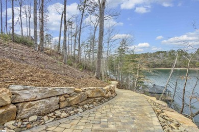 Waterfront living at its finest. Wake each morning to panoramic on The Cliffs At Keowee Falls in South Carolina - for sale on GolfHomes.com, golf home, golf lot