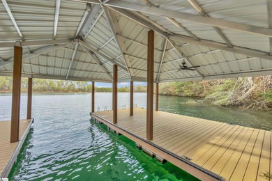 Waterfront living at its finest. Wake each morning to panoramic on The Cliffs At Keowee Falls in South Carolina - for sale on GolfHomes.com, golf home, golf lot