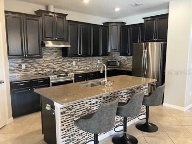 Welcome to this beautifully maintained home, 4 bedrooms 3 baths on Summerfield Crossing Golf Club in Florida - for sale on GolfHomes.com, golf home, golf lot