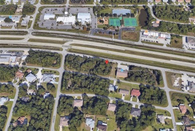 Commercial lot in the heart of Englewood just off 776 that has on Oyster Creek Golf Club in Florida - for sale on GolfHomes.com, golf home, golf lot
