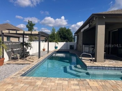 Welcome to this beautifully maintained home, 4 bedrooms 3 baths on Summerfield Crossing Golf Club in Florida - for sale on GolfHomes.com, golf home, golf lot