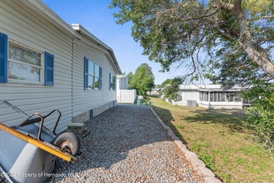 A pristine, move-in ready home in a gated 55+ community with on Brookridge Country Club in Florida - for sale on GolfHomes.com, golf home, golf lot