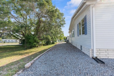 A pristine, move-in ready home in a gated 55+ community with on Brookridge Country Club in Florida - for sale on GolfHomes.com, golf home, golf lot