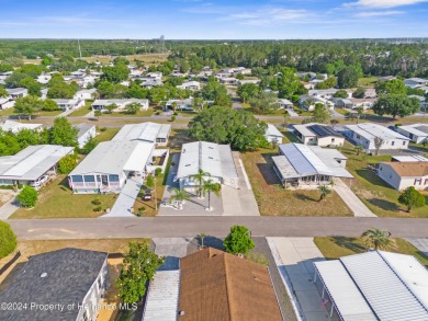 A pristine, move-in ready home in a gated 55+ community with on Brookridge Country Club in Florida - for sale on GolfHomes.com, golf home, golf lot