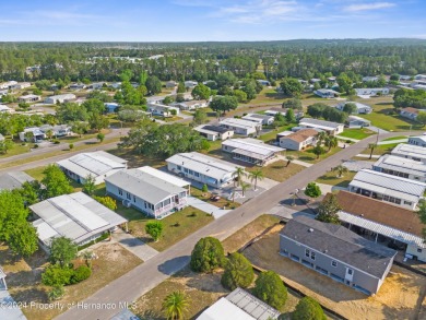 A pristine, move-in ready home in a gated 55+ community with on Brookridge Country Club in Florida - for sale on GolfHomes.com, golf home, golf lot