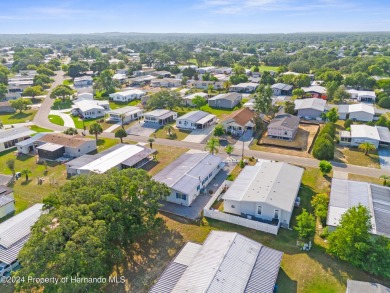 A pristine, move-in ready home in a gated 55+ community with on Brookridge Country Club in Florida - for sale on GolfHomes.com, golf home, golf lot