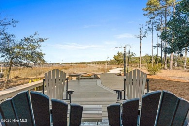 Prepare to be captivated by this extraordinary waterfront on Oak Island Golf Club in North Carolina - for sale on GolfHomes.com, golf home, golf lot