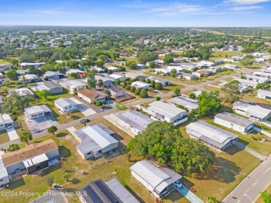 A pristine, move-in ready home in a gated 55+ community with on Brookridge Country Club in Florida - for sale on GolfHomes.com, golf home, golf lot