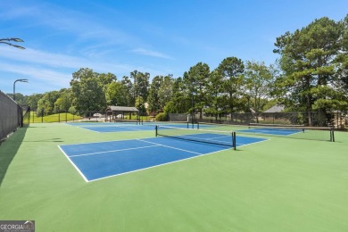 Lovely .68-acre lot perfectly situated at the 11th tee of the on Royal Lakes Golf and Country Club in Georgia - for sale on GolfHomes.com, golf home, golf lot