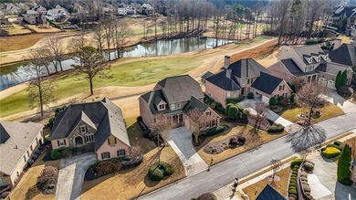 Luxury living in the prestigious Enclave section of Woodmont on Woodmont Golf and Country Club in Georgia - for sale on GolfHomes.com, golf home, golf lot