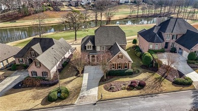 Luxury living in the prestigious Enclave section of Woodmont on Woodmont Golf and Country Club in Georgia - for sale on GolfHomes.com, golf home, golf lot