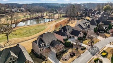 Luxury living in the prestigious Enclave section of Woodmont on Woodmont Golf and Country Club in Georgia - for sale on GolfHomes.com, golf home, golf lot