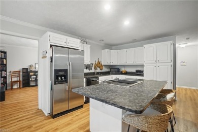 This beautiful Kiln Creek home has fantastic curb appeal and a on Kiln Creek Golf and Country Club in Virginia - for sale on GolfHomes.com, golf home, golf lot