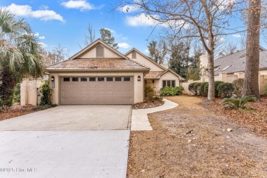 This beautifully remodeled 3-bedroom, 2-bathroom home in on Country Club of Landfall in North Carolina - for sale on GolfHomes.com, golf home, golf lot