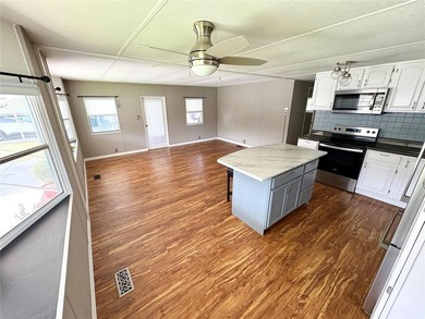 Charming Remodeled Home with Modern Upgrades! Welcome to this on High Point Golf Club, Inc. in Florida - for sale on GolfHomes.com, golf home, golf lot