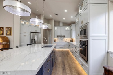 Discover refined living inside the gated Canyon Ridge community on TPC Las Vegas in Nevada - for sale on GolfHomes.com, golf home, golf lot