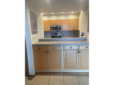 Ground floor condo with no stairs and breathtaking waterviews on Pasadena Yacht and Country Club in Florida - for sale on GolfHomes.com, golf home, golf lot
