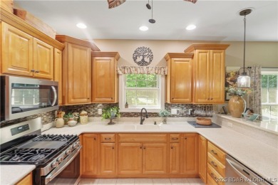 Live the maintenance-free dream in Porto Cima! This beautifully on The Club At Porto Cima in Missouri - for sale on GolfHomes.com, golf home, golf lot