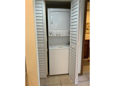 Ground floor condo with no stairs and breathtaking waterviews on Pasadena Yacht and Country Club in Florida - for sale on GolfHomes.com, golf home, golf lot