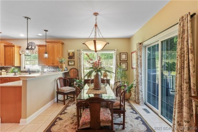 Live the maintenance-free dream in Porto Cima! This beautifully on The Club At Porto Cima in Missouri - for sale on GolfHomes.com, golf home, golf lot