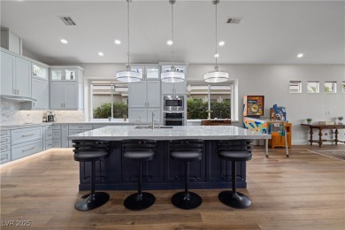 Discover refined living inside the gated Canyon Ridge community on TPC Las Vegas in Nevada - for sale on GolfHomes.com, golf home, golf lot