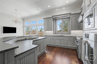 Positioned along the storied banks of Silk Hope Harbour Marina on The Ford Field and River Club  in Georgia - for sale on GolfHomes.com, golf home, golf lot