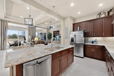 Experience golf course living at its finest in this beautifully on Wildhorse Golf Club of Robson Ranch in Texas - for sale on GolfHomes.com, golf home, golf lot