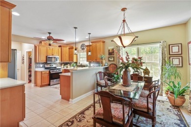 Live the maintenance-free dream in Porto Cima! This beautifully on The Club At Porto Cima in Missouri - for sale on GolfHomes.com, golf home, golf lot