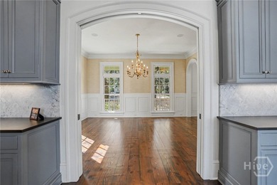 Positioned along the storied banks of Silk Hope Harbour Marina on The Ford Field and River Club  in Georgia - for sale on GolfHomes.com, golf home, golf lot