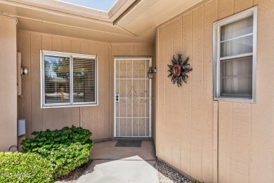 FURNISHED AND READY FOR YOU!!  This sunny, bright end unit in on Stardust Golf Course in Arizona - for sale on GolfHomes.com, golf home, golf lot