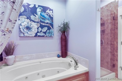 Live the maintenance-free dream in Porto Cima! This beautifully on The Club At Porto Cima in Missouri - for sale on GolfHomes.com, golf home, golf lot