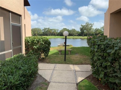 Ground floor condo with no stairs and breathtaking waterviews on Pasadena Yacht and Country Club in Florida - for sale on GolfHomes.com, golf home, golf lot