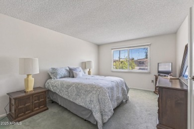 FURNISHED AND READY FOR YOU!!  This sunny, bright end unit in on Stardust Golf Course in Arizona - for sale on GolfHomes.com, golf home, golf lot