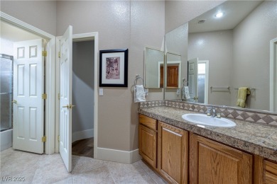 Discover refined living inside the gated Canyon Ridge community on TPC Las Vegas in Nevada - for sale on GolfHomes.com, golf home, golf lot