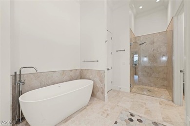 Experience the perfect blend of spacious luxury and serene on The Sanctuary Golf Club in Florida - for sale on GolfHomes.com, golf home, golf lot