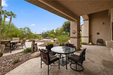 Discover refined living inside the gated Canyon Ridge community on TPC Las Vegas in Nevada - for sale on GolfHomes.com, golf home, golf lot