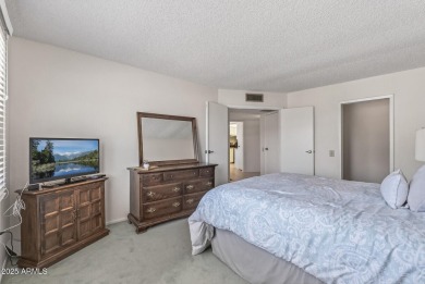 FURNISHED AND READY FOR YOU!!  This sunny, bright end unit in on Stardust Golf Course in Arizona - for sale on GolfHomes.com, golf home, golf lot