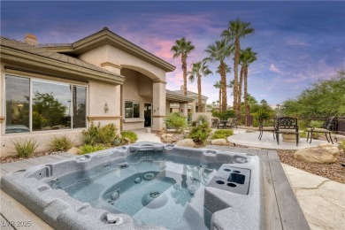 Discover refined living inside the gated Canyon Ridge community on TPC Las Vegas in Nevada - for sale on GolfHomes.com, golf home, golf lot