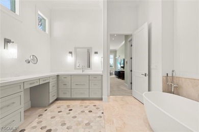 Experience the perfect blend of spacious luxury and serene on The Sanctuary Golf Club in Florida - for sale on GolfHomes.com, golf home, golf lot