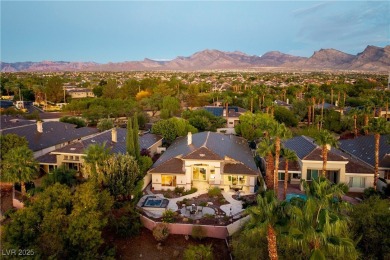 Discover refined living inside the gated Canyon Ridge community on TPC Las Vegas in Nevada - for sale on GolfHomes.com, golf home, golf lot