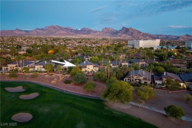 Discover refined living inside the gated Canyon Ridge community on TPC Las Vegas in Nevada - for sale on GolfHomes.com, golf home, golf lot