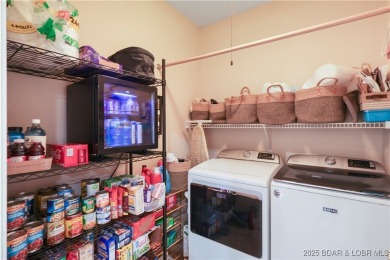 Live the maintenance-free dream in Porto Cima! This beautifully on The Club At Porto Cima in Missouri - for sale on GolfHomes.com, golf home, golf lot